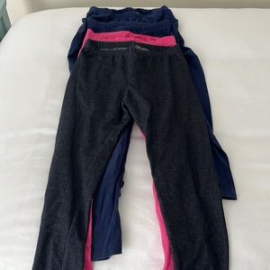 Six pairs of Cat and Jack leggings.